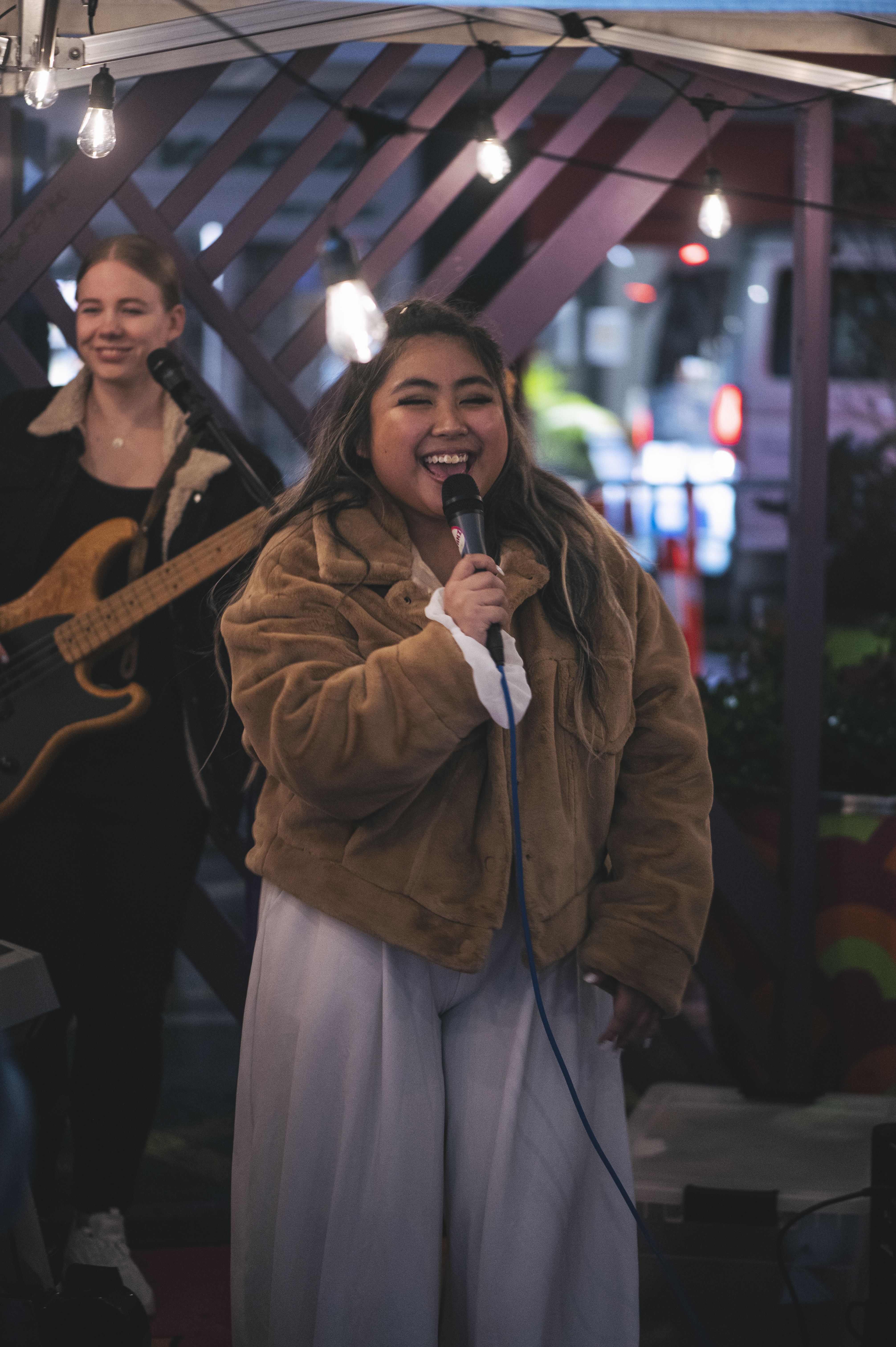 Young singer performing joyfully