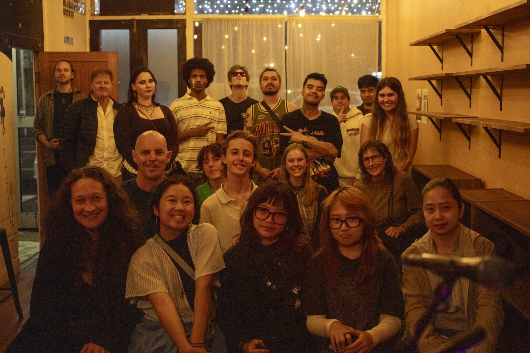 A full room of performers, crew and whānau together after an open mic night