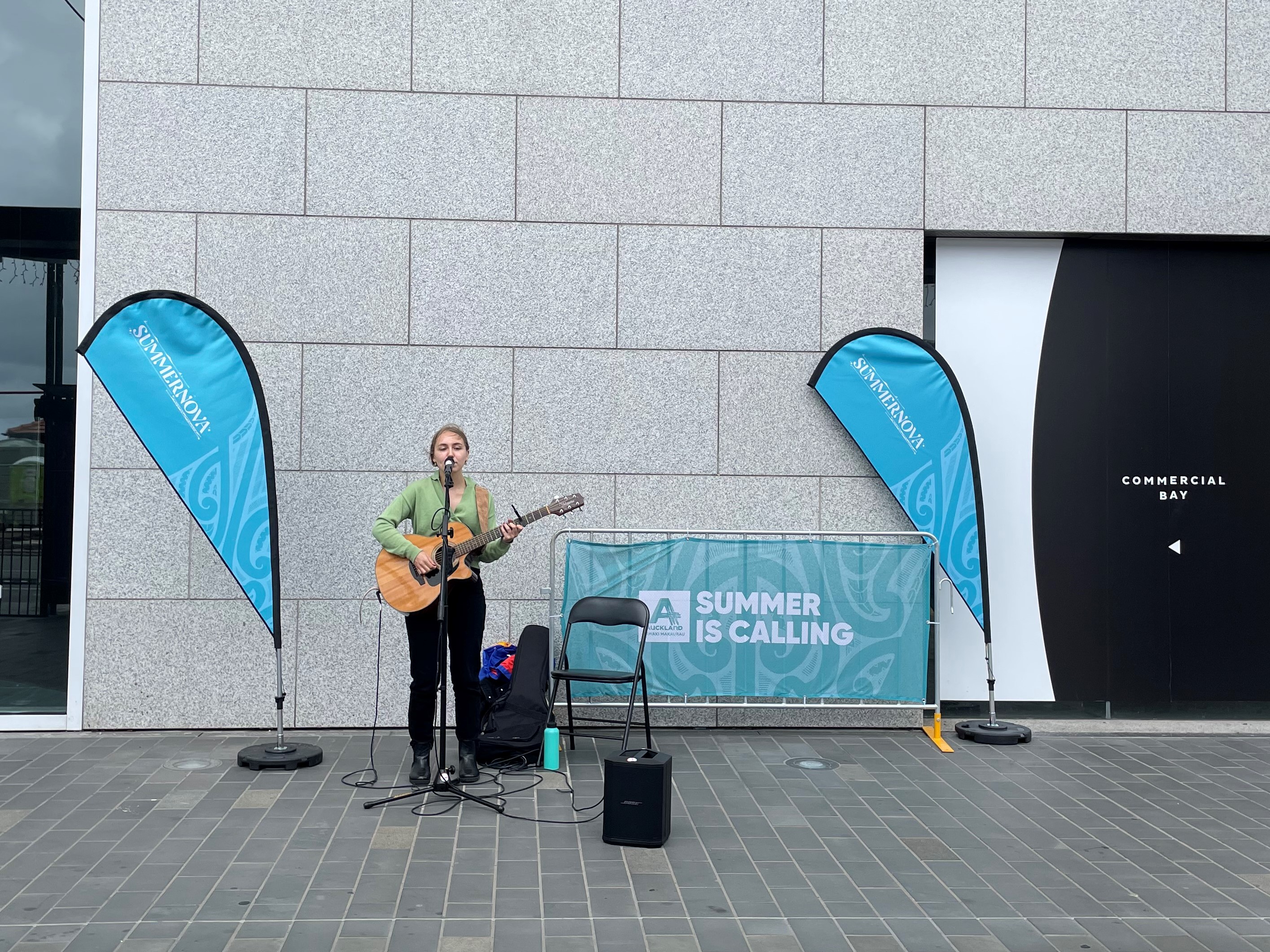 Young musician performing on the Auckland waterfront